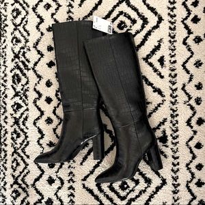 Knee high black crocodile boots